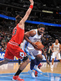 Chicago Bulls v Denver Nuggets: Nene and Joakim Noah Photographic Print by Garrett Ellwood