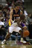 Los Angeles Lakers v Milwaukee Bucks: Earl Boykins and Pau Gasol Photographic Print by Jonathan Daniel