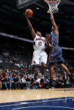 Charlotte Bobcats v Atlanta Hawks: Jeff Teague Photographic Print by Scott Cunningham