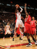 Houston Rockets v Toronto Raptors: Sonny Weems and Jordan Hill Photographic Print by Ron Turenne