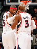Indiana Pacers v Atlanta Hawks: Josh Smith and Damien Wilkins Photographic Print by Kevin Cox