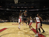 Chicago Bulls v Toronto Raptors: Joey Dorsey and Carlos Boozer Photographic Print by Ron Turenne