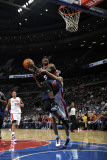 Atlanta Hawks v Detroit Pistons: Josh Smith and Tayshaun Prince Fotografisk tryk af Allen Einstein