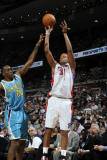 New Orleans Hornets v Detroit Pistons: Charlie Villanueva and Quincy Pondexter Photographic Print by Allen Einstein