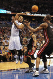 Miami Heat v Orlando Magic: Jameer Nelson and Chris Bosh Photographic Print by Mike Ehrmann