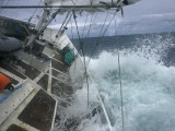 Waves Splash over the Deck of  the Yacht the Golden Fleece Photographic Print by Maria Stenzel