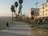 A Jogger on a Bike Path Along Venice Beach Fotoprint van Rich Reid