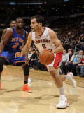 New York Knicks v Toronto Raptors: Jose Calderon and Raymond Felton Photographic Print by Ron Turenne