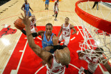 Oklahoma City Thunder v Chicago Bulls: Russell Westbrook and Taj Gibson Photographic Print by Joe Murphy