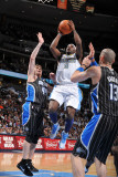 Orlando Magic v Denver Nuggets: Ty Lawson and Jason Williams Photographic Print by Garrett Ellwood