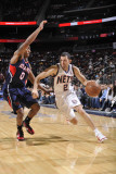Atlanta Hawks v New Jersey Nets: Jordan Farmar and Jeff Teague Photographic Print by David Dow
