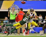 Charles Woodson Action from Super Bowl XLV Photo