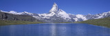 Panoramic View of a Snow Covered Mountain by a Lake, Matterhorn, Zermatt, Switzerland Autocollant mural par Panoramic Images 