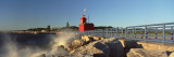 Waves Crashing on Rocks Outside a Lighthouse, Sunset Red Lighthouse, Holland, Minnesota, USA Wall Decal by Panoramic Images 