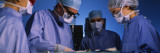 Four Surgeons in an Operating Room, Hospital Wall Decal by Panoramic Images 