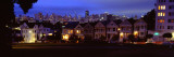 Buildings Lit Up Dusk, Alamo Square, San Francisco, California, USA Autocollant mural par Panoramic Images 