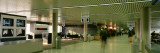 Group of People Walking in the Corridor of an Airport, Anchorage, Alaska, USA Vinilos decorativos por Panoramic Images Group of People Walking in the Corridor of an Airport, Anchorage, Alaska, USA Vinilos decorativos por Panoramic Images