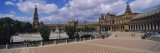 Tourists at a Plaza, Plaza de Espana, Seville, Andalusia, Spain Wall Decal by Panoramic Images 