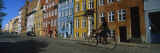 Woman Riding a Bicycle, Copenhagen, Denmark Wall Decal by Panoramic Images 