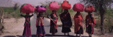 Women Standing on a Road with Luggage on Their Head, Siana, Jodhpur, Rajasthan, India Wall Decal by Panoramic Images 