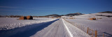 Haystacks in a Snow Covered Landscape, Avon, Montana, USA Vinilos decorativos por Panoramic Images Haystacks in a Snow Covered Landscape, Avon, Montana, USA Vinilos decorativos por Panoramic Images