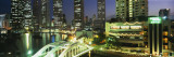 Buildings Lit Up at Night, Singapore Vinilos decorativos por Panoramic Images