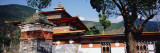 Temple in a City, Chimi Lhakhang, Punakha, Bhutan Wall Decal by Panoramic Images 