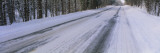 Empty Road Passing through a Snow Covered Landscape, Michigan, USA Vinilos decorativos por Panoramic Images