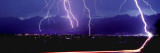 Lightning over a City Wall Decal by Panoramic Images 