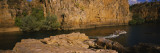 Group of People in a Barge, Nitmiluk National Park, Northern Territory, Australia Vinilos decorativos por Panoramic Images Group of People in a Barge, Nitmiluk National Park, Northern Territory, Australia Vinilos decorativos por Panoramic Images