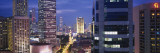 Buildings Lit Up at Night, Singapore Vinilos decorativos por Panoramic Images