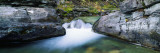 Waterfall Cascading Through Boulders Vinilos decorativos por Panoramic Images Waterfall Cascading Through Boulders Vinilos decorativos por Panoramic Images