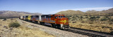 Train on Santa Fe Railroad Track, Arizona, USA Vinilos decorativos por Panoramic Images Train on Santa Fe Railroad Track, Arizona, USA Vinilos decorativos por Panoramic Images