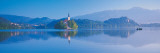 Reflection of Mountains and Buildings in Water, Lake Bled, Slovenia Wall Decal by Panoramic Images 