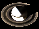 Saturn Sits Enveloped by the Full Splendor of Its Stately Rings Photographic Print by Stocktrek Images 