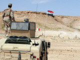 An Instructor Watches an Iraqi Army Soldier in the School of Infantry Fire a Pkc Machine Gun Photographic Print by Stocktrek Images 