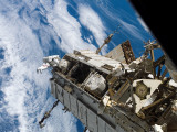 Astronaut STS-116 Mission Specialist Participates in Extravehicular Activity Photographic Print by Stocktrek Images 