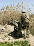 Marines Search Around an Iraqi Home North of Hit, Iraq, March 9, 2007, for Weapons Caches Photographic Print by Stocktrek Images 