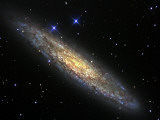 The Sculptor Galaxy, NGC 253 in the Constellation Sculptor Photographic Print by Stocktrek Images 