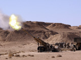 Searing Flame and Smoke Emerge from the Muzzle of an M198 Howitzer Photographic Print by Stocktrek Images 