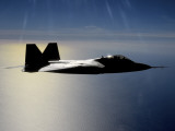 Over California, an F/A-22 Raptor Files a Training Mission Here Photographic Print by Stocktrek Images 