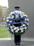 Airman Holds a Wreath While Waiting for a Special Ceremony to Start at the Air Force Memorial Photographic Print by Stocktrek Images 