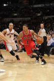 Chicago Bulls v Toronto Raptors, Toronto - February 23: Derrick Rose and Jerryd Bayless Photographic Print by Ron Turenne