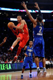 2011 NBA All Star Game, Los Angeles, CA - February 20: Russell Westbrook and Joe Johnson Photographie par Kevork Djansezian
