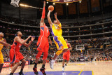 Atlanta Hawks v Los Angeles Lakers, Los Angeles, CA - February 22: Kobe Bryant and Josh Smith Photographic Print by Andrew Bernstein