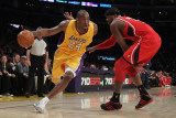 Atlanta Hawks v Los Angeles Lakers, Los Angeles, CA - February 22: Kobe Bryant and Josh Smith Photographic Print by Jeff Gross