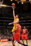 Atlanta Hawks v Los Angeles Lakers, Los Angeles, CA - February 22: Pau Gasol and Al Horford Photographic Print by Andrew Bernstein