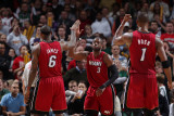 Miami Heat v Milwaukee Bucks, Milwaukee, WI - January 07: LeBron James, Dwyane Wade and Chris Bosh Photographic Print by Gary Dineen