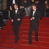 Prince William (left) and his brother Prince Harry arrive for the world premiere of the new James B Photographic Print