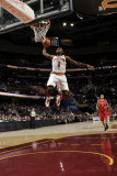 Houston Rockets v Cleveland Cavaliers, Cleveland, Oh - February 23: Christian Eyenga and Kevin Mart Photographic Print by David Liam Kyle